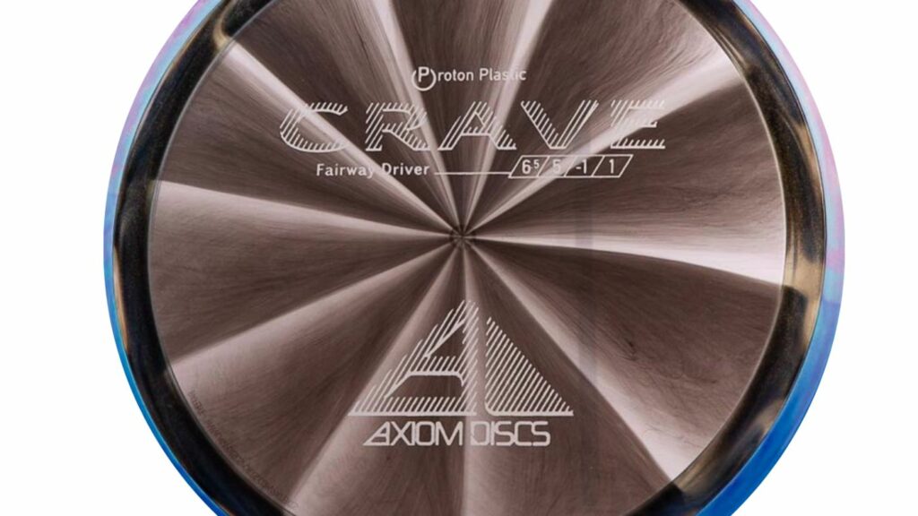 An Axiom Proton Crave Disc Grey-ish Color with Silver Stamp

Text from top to bottom
Proton Plastic
Crave 
Fairway Driver - Flight Numbers 6.5, 5, -1, 1
Axiom Discs