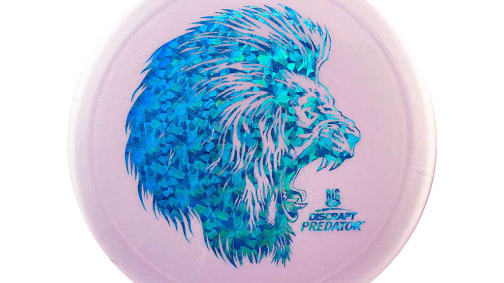 A Discraft Big Z Predator pink disc with blue shatter stamp

The image on the disc has a fierce lion, poised and looking ready to devour its prey