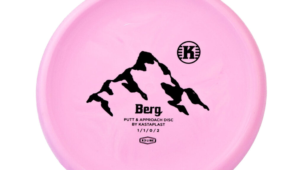 A pink Kastaplast Berg approach disc with Black stamp. The disc has an image that resembles a mountain with snowcaps.